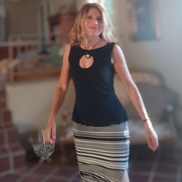 Olga  De Caro